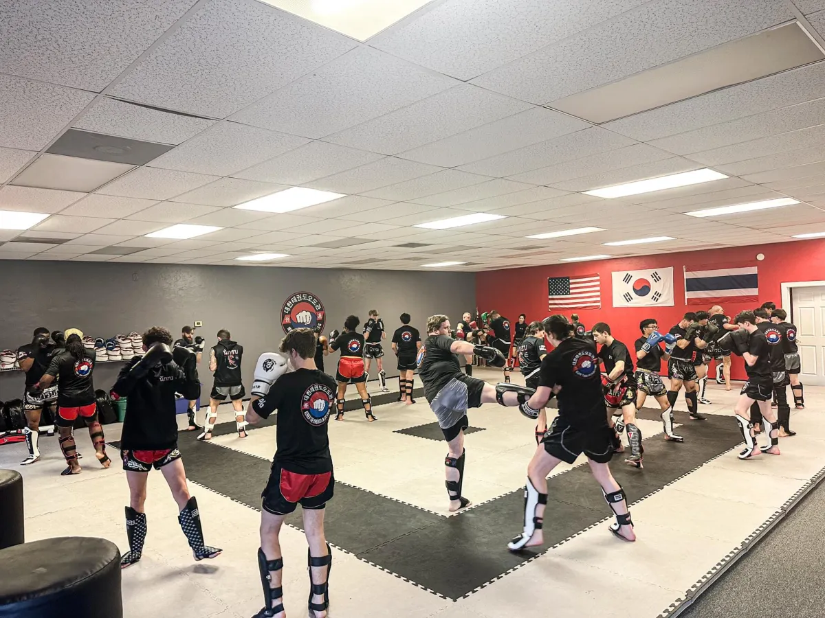 Students practicing kick drills at ODK Striking Academy