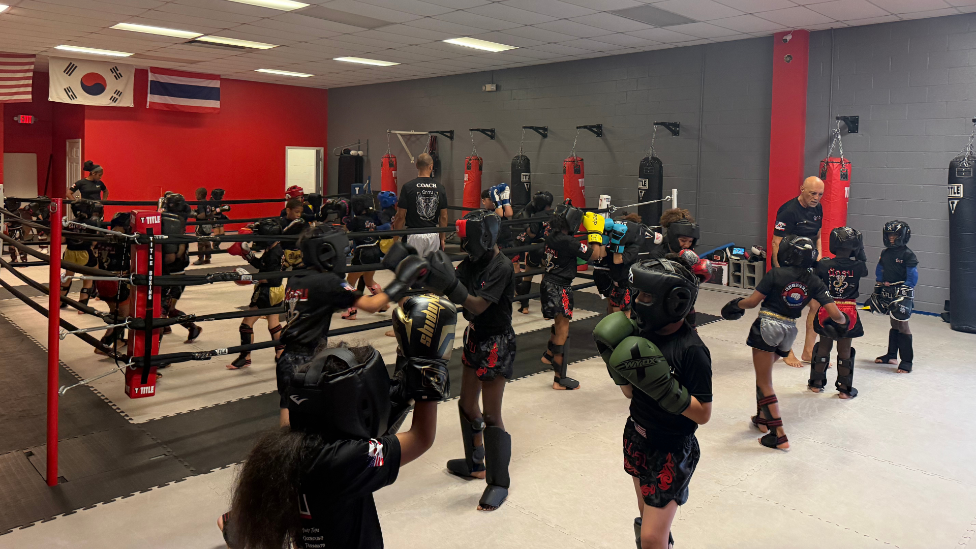 Kids sparring class in the ring at ODK Striking Academy