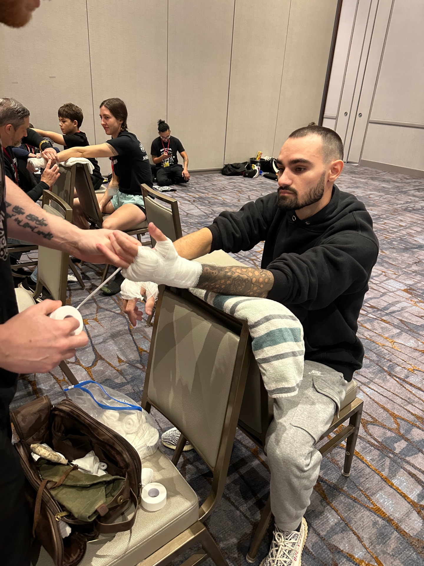 Bryce Bonilla getting his hands wrapped before a fight